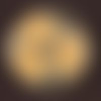 Penicillium spp.. Kulturunterseite: gelblich bis cremige Farbe; deutliche radiäre Furchung/Fältel...